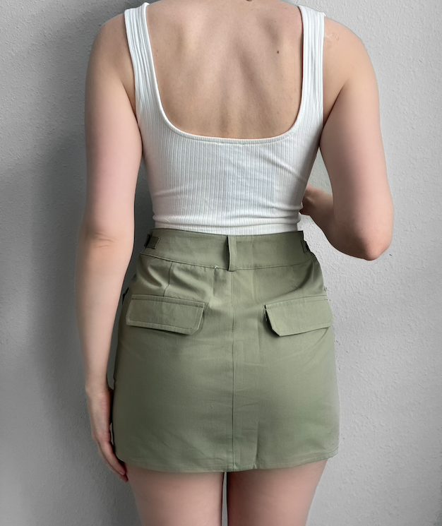 Green mini skirt with pockets online